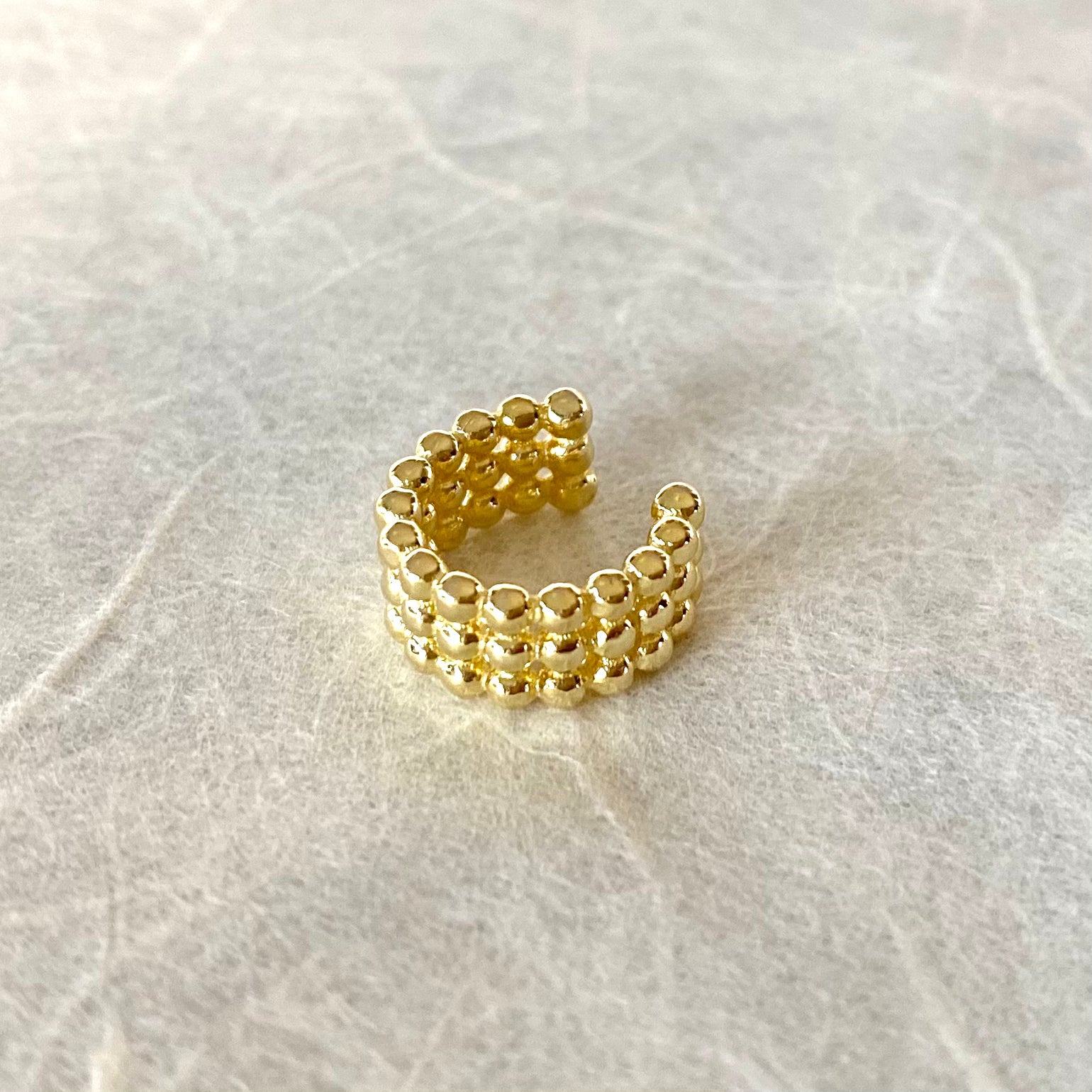 Ear Cuff a tre file di Palline