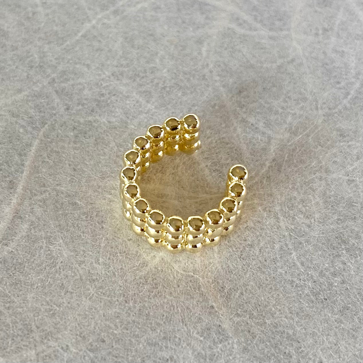 Ear Cuff a tre file di Palline